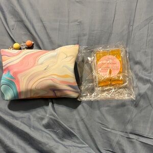 Colorful Swirl Pouch with makeup and various items